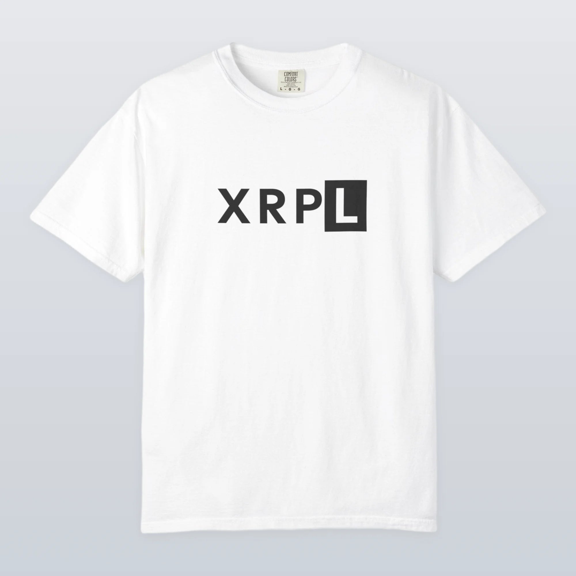 White XRP t-shirt with 'XRPL' logo on a light gray background
