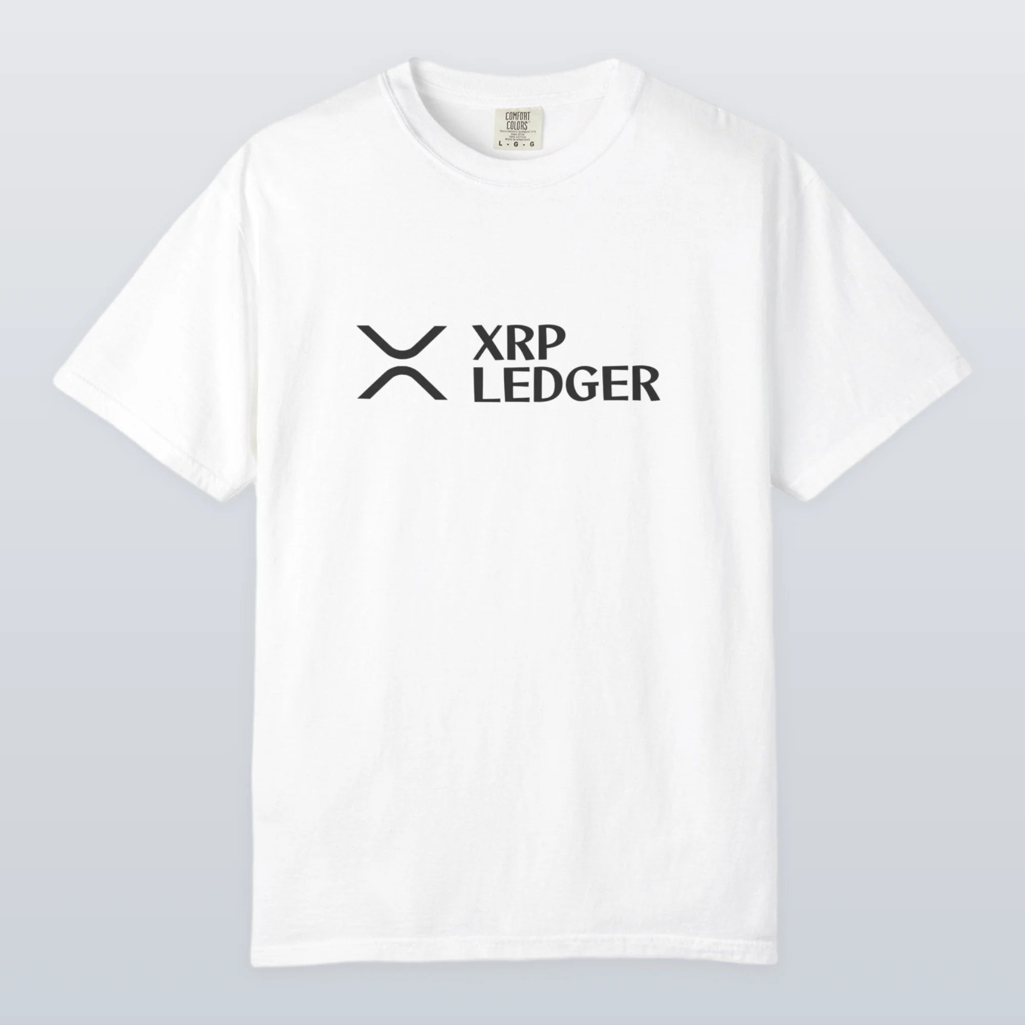 White XRP t-shirt with XRP Ledger logo on a light gray background